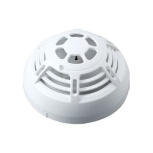 A heat detector device mounted on a wall, designed to sense elevated temperatures for fire safety.