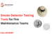 Fire maintenance technician using smoke detector testing tools to inspect and test smoke detectors during routine fire alarm system maintenance.